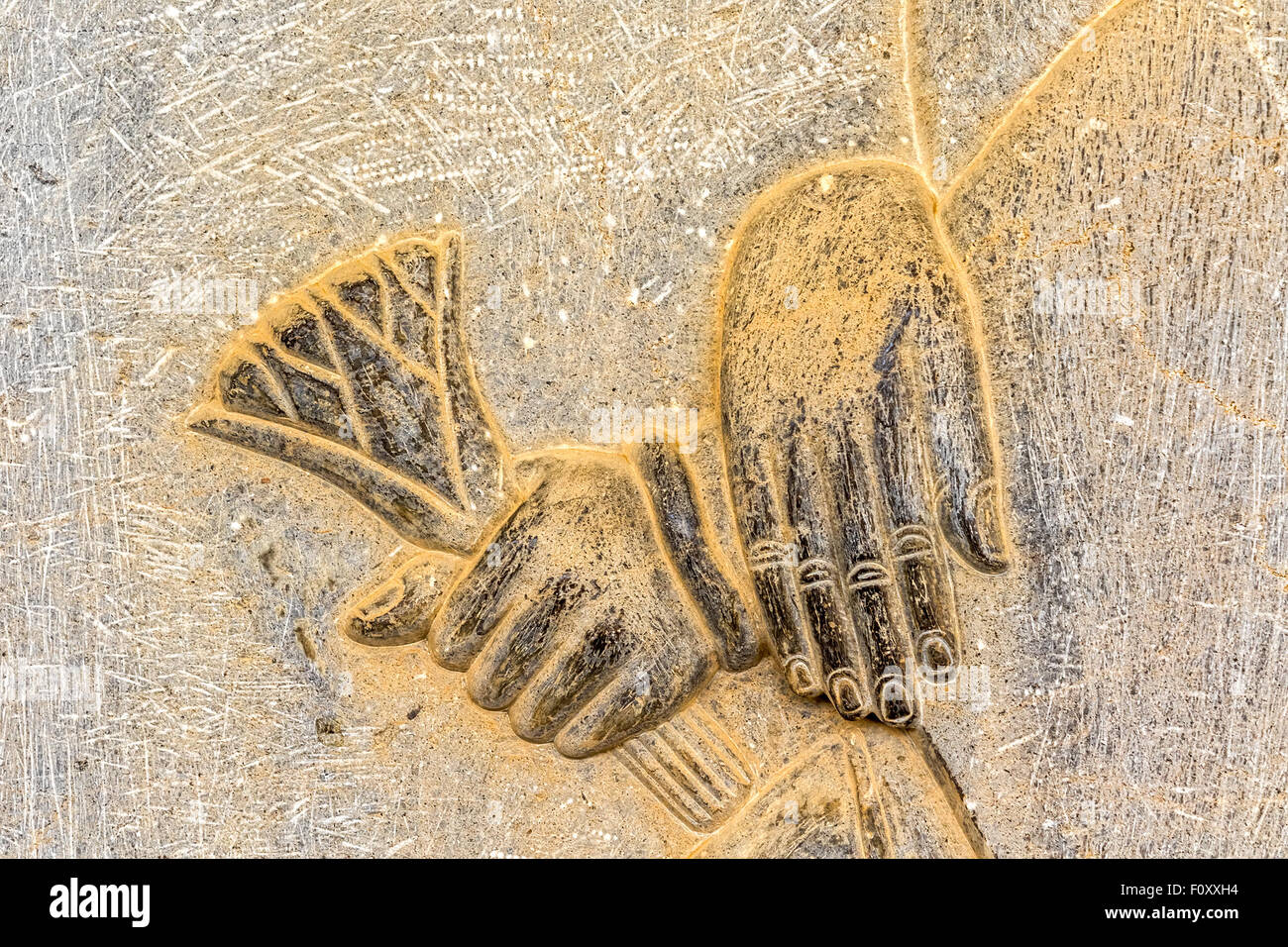 Hands relief detail Persepolis Stock Photo