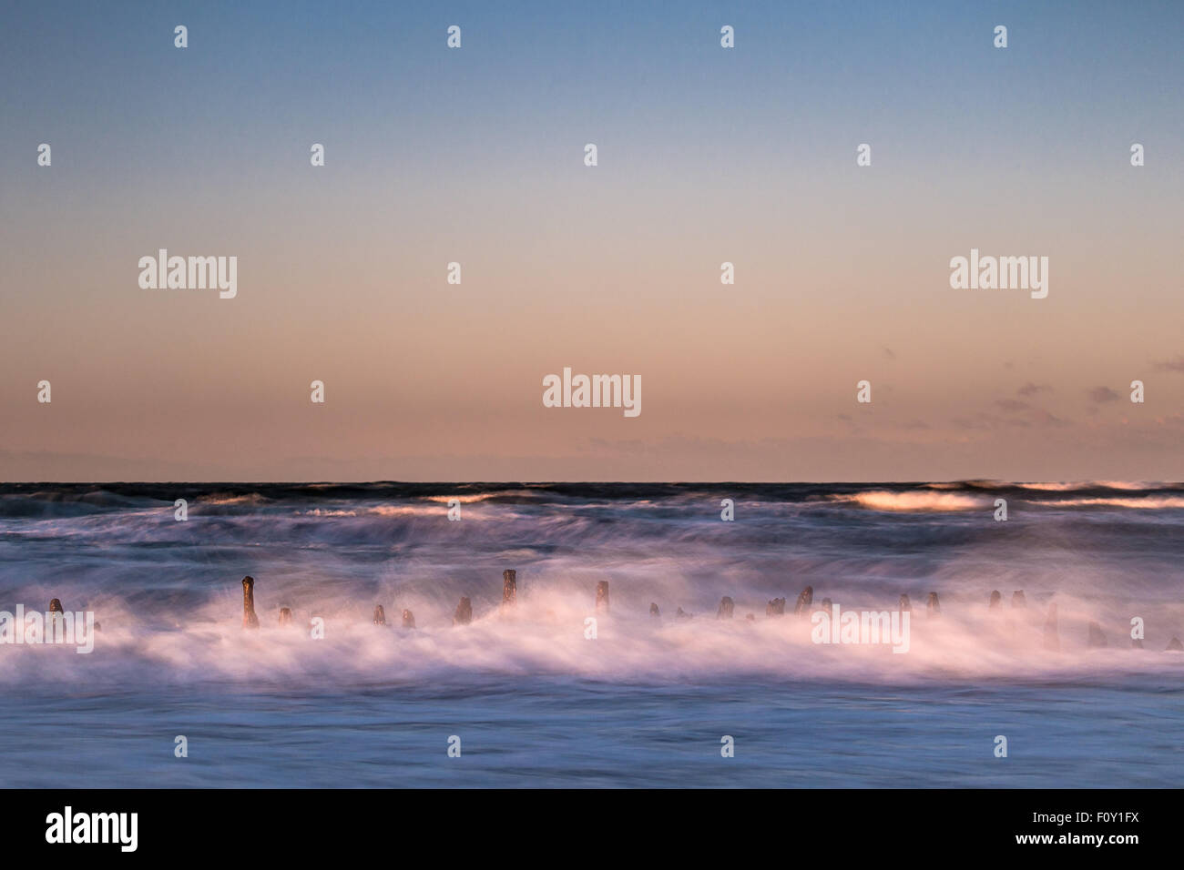 Groynes on shore of the Baltic Sea on a stormy day Stock Photo - Alamy