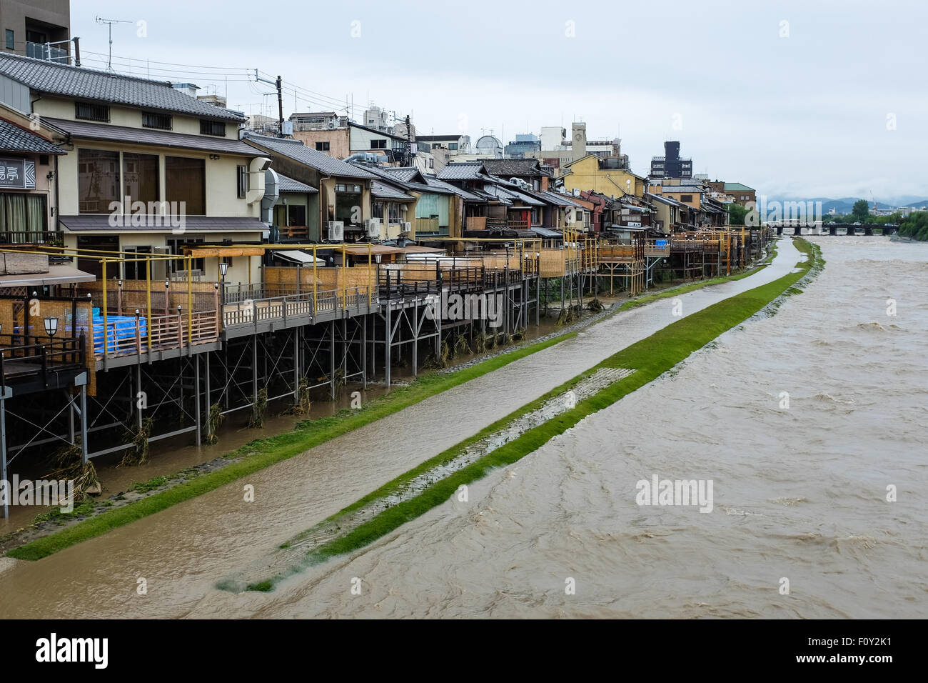 Kyoto's Kamogawa river flooded after Typhoon Nangka passed over Japan. [18th July, 2015] Stock Photo