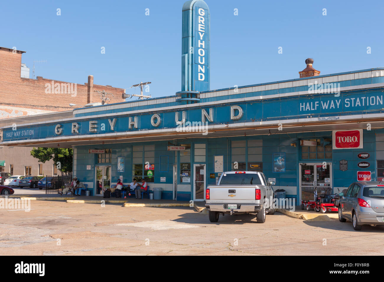 Passengers wait for their bus at the historic Greyhound Bus Station in Jackson, Tennessee. Stock Photo