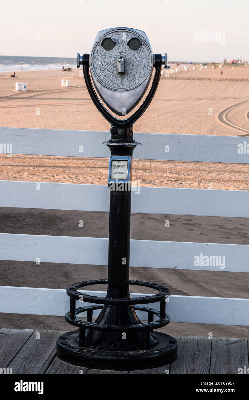 Coin-operated sightseeing binoculars on beach Stock Photo