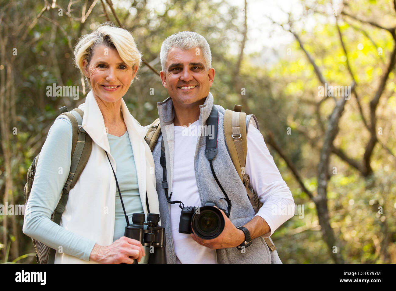happy hikers couple enjoying outdoor activity Stock Photo