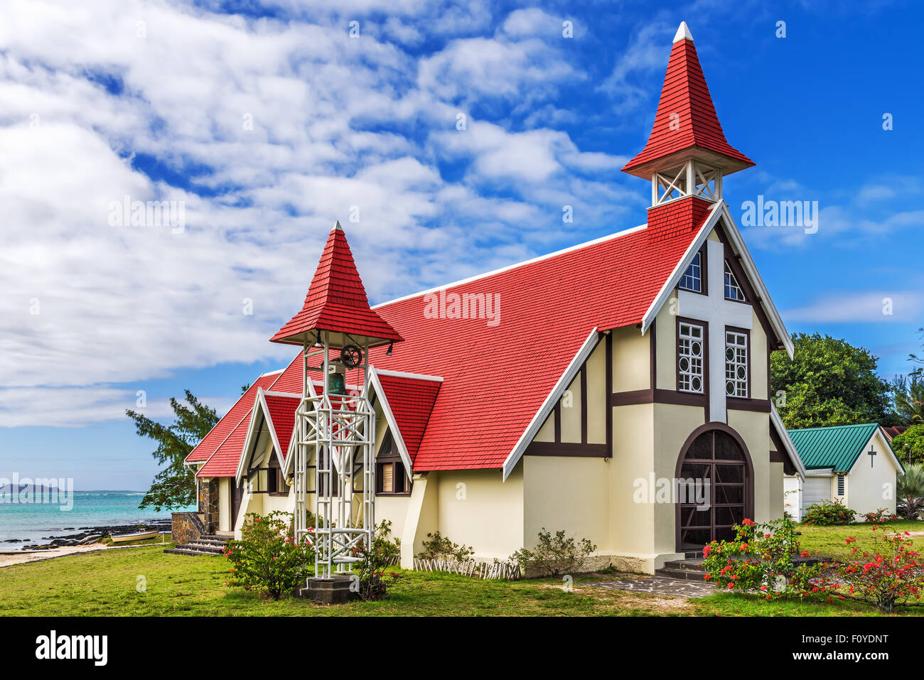 Notre Dame Auxiliatrice Church with distinctive red roof at Cap