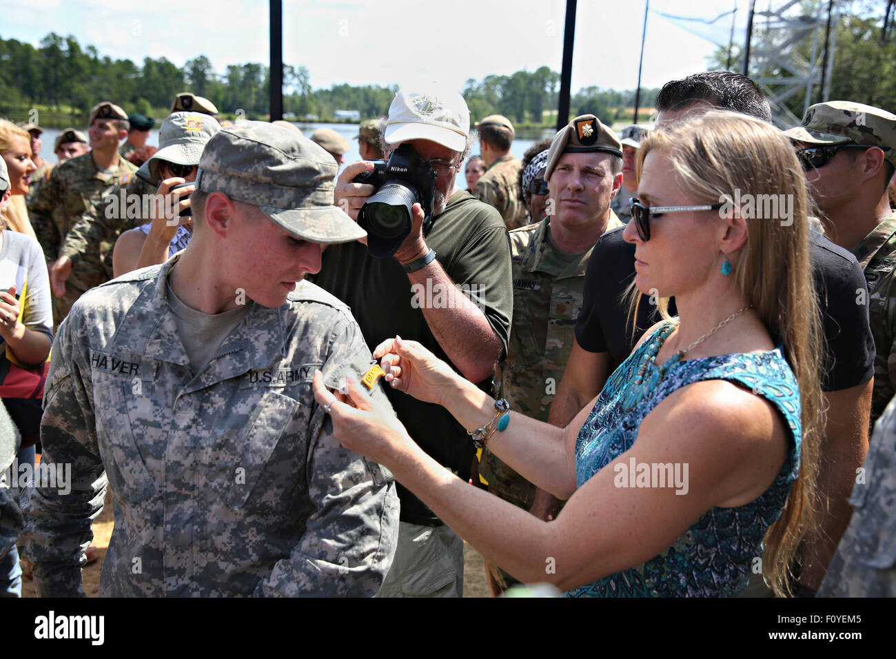 U.S. Army 1st Lt. Shaye Haver, has the elite Ranger Tab pinned on her uniform after becoming the first woman to graduate from Army Ranger school August 21, 2015 at Fort Benning, Georgia. Haver and fellow soldier 1st Lt. Kristen Griest became the first women to graduate from the 61-day-long Ranger course considered one of the most intense and demanding in the military. Stock Photo