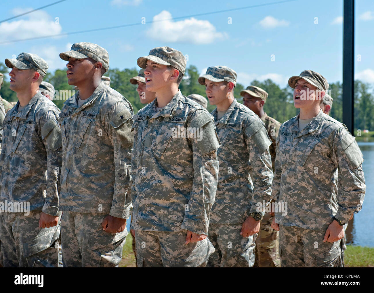 U.S. Army Captain Kristen Griest , left, and fellow soldier 1st Lt Shaye Haver, center, during ceremonies as they become the first women to graduate from Army Ranger school August 21, 2015 at Fort Benning, Georgia. Stock Photo