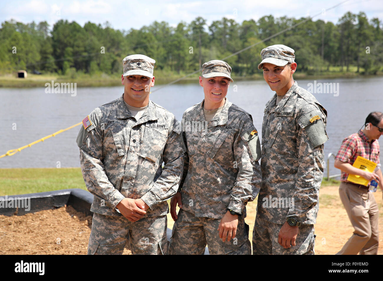 U.S. Army 1st Lt. Shaye Haver poses with fellow soldiers after graduation ceremonies at the Army Ranger school August 21, 2015 at Fort Benning, Georgia. Haver and fellow soldier Captain Kristen Griest became the first women to graduate from the 61-day-long Ranger course considered one of the most intense and demanding in the military. Stock Photo