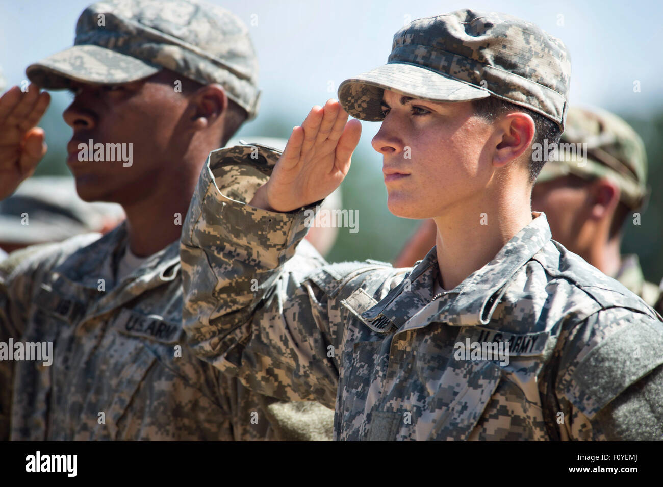 U.S. Army Captain Kristen Griest salutes during graduation ceremonies at the Army Ranger school August 21, 2015 in Fort Benning, Georgia. Griest and fellow soldier 1st Lt Shaye Haver became the first women to graduate from the 61-day-long Ranger course considered one of the most intense and demanding in the military. Stock Photo
