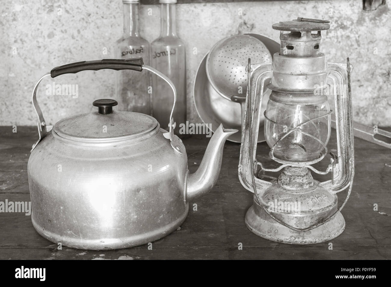 Old objects once: aluminum kettle and old acetylene lamp Stock Photo