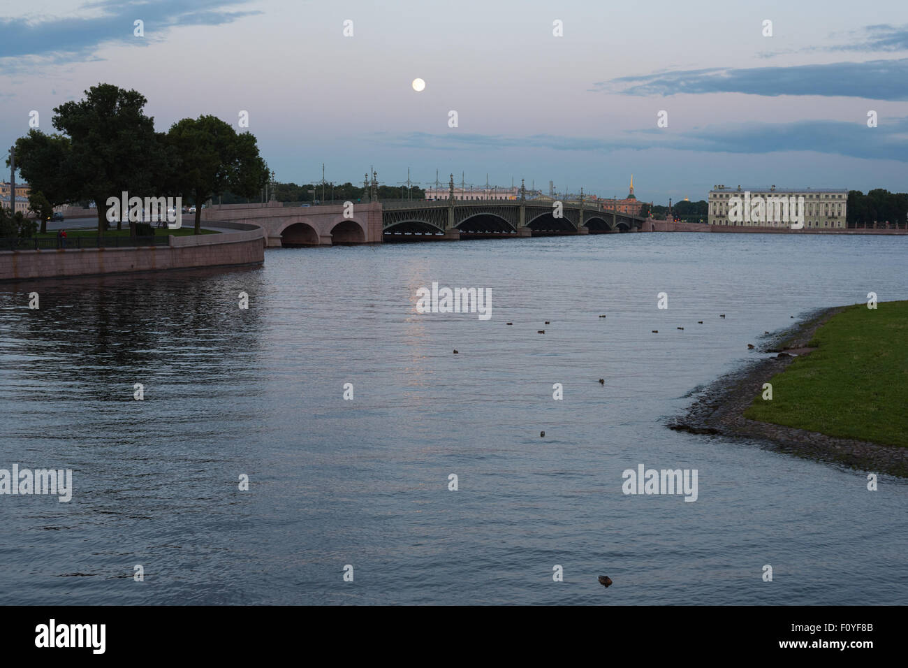 White nights in Saint Petersburg. Trinity bridge (Troitskiy Most) across the Neva river in July Stock Photo