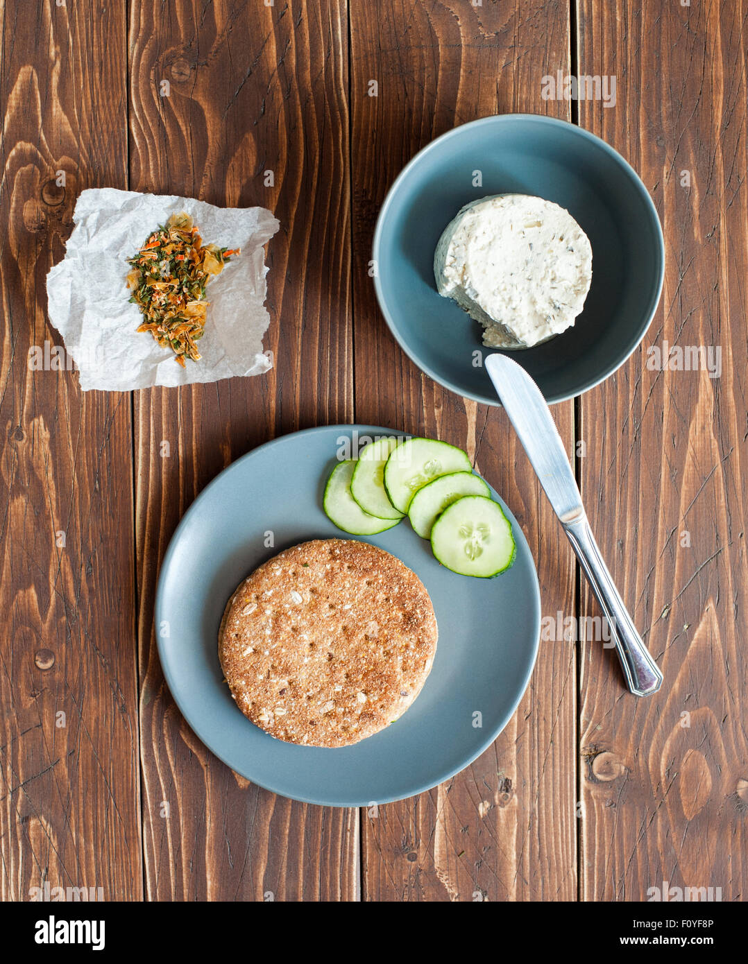 Sandwich with cheese and fresh cucumbers on the wooden background Stock Photo