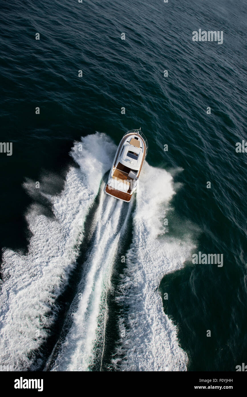 Aerial of luxurious yacht sailing away in the ocean Stock Photo - Alamy
