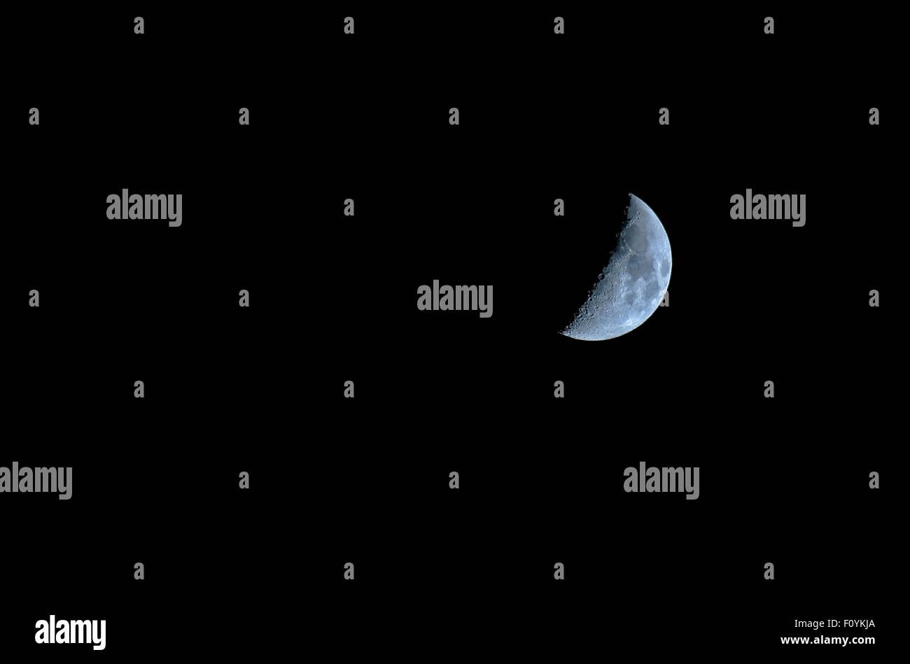 Waxing crescent Moon with Lunar X aka Werner X, on August 21, 2015. Lunar V is also visible next to the X. It is on the rim of t Stock Photo