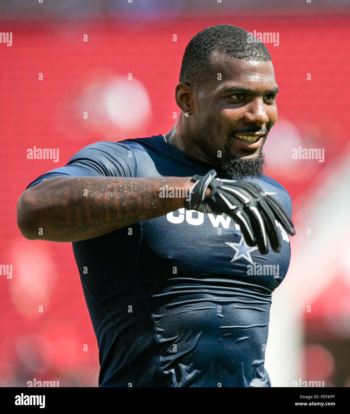 Dallas Cowboys QB Dustin Vaughn (10) eludes San Francisco 49ers in the  second quarter at Levi's Stadium in Santa Clara, California on August 23,  2015. The 49ers defeated the Cowboys 23-6 in