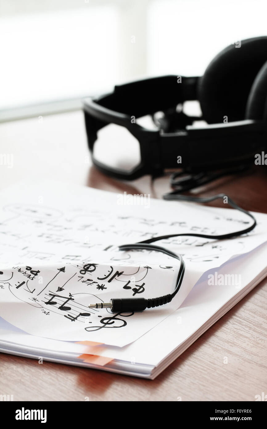 composing music concept with shallow DOF evenly matched jack of headphone and copy space Stock Photo