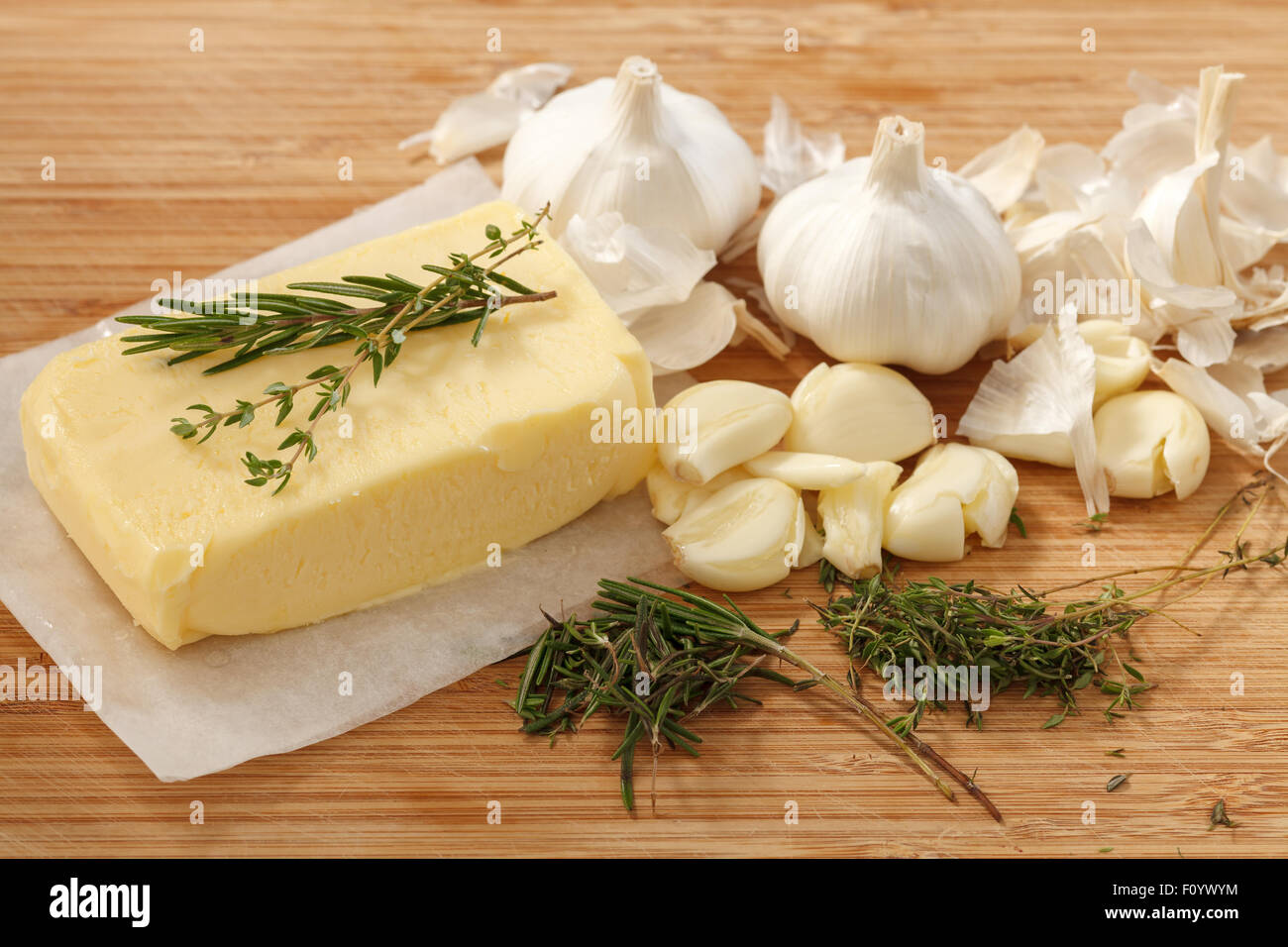 compound butter ingredients herb thyme rosemary garlic fresh homemade italian food tasty Stock Photo
