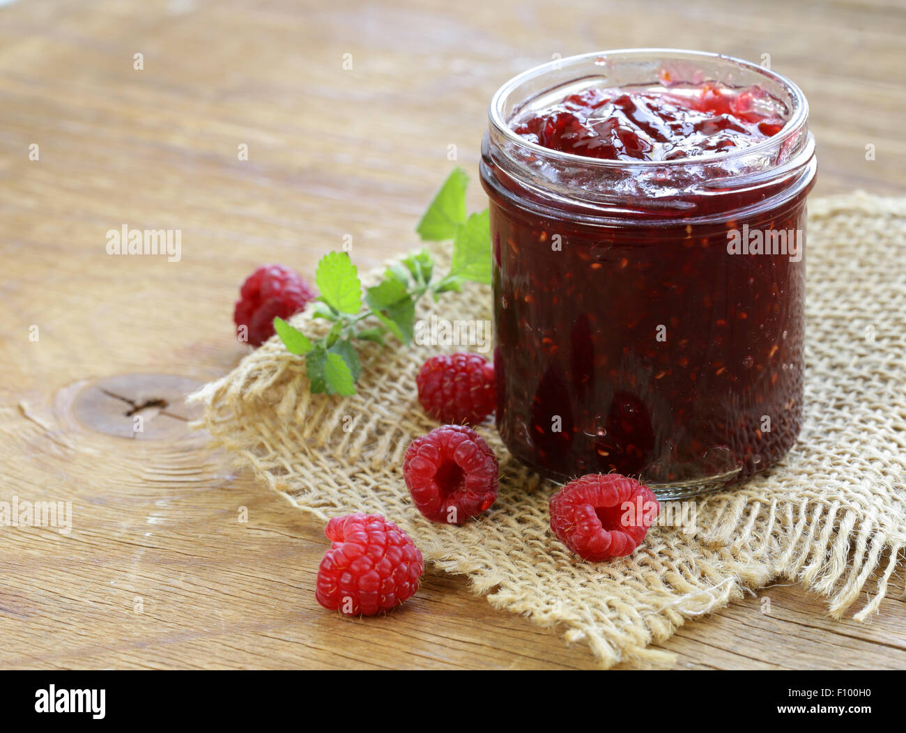 natural organic homemade raspberry jam in a glass jar Stock Photo - Alamy