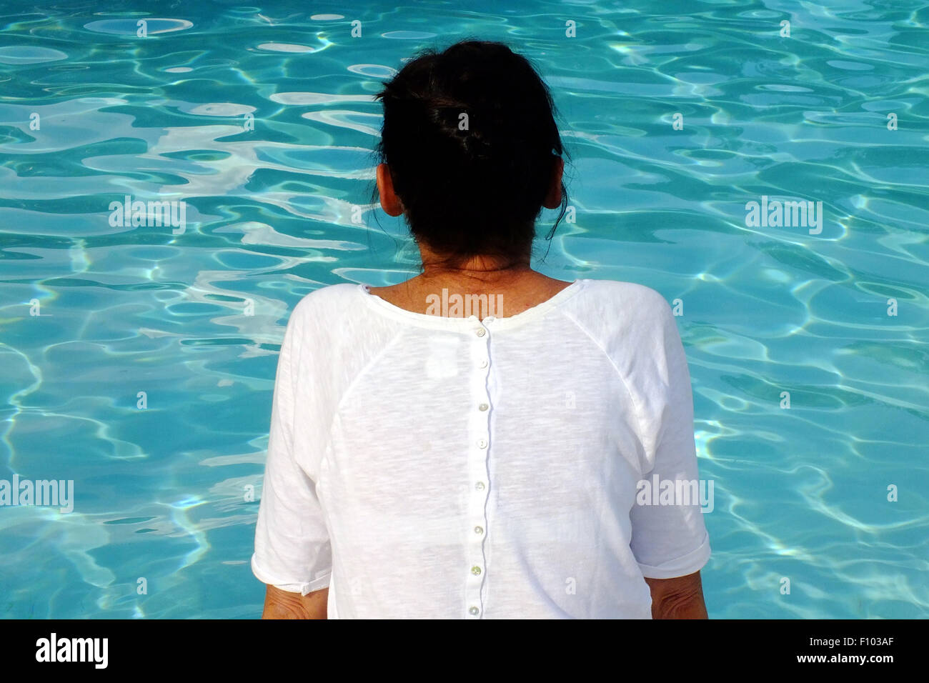 Mature woman swimming pool hi-res stock photography and images - Alamy