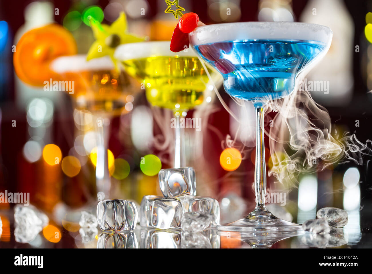 Martini drinks on bar counter Stock Photo
