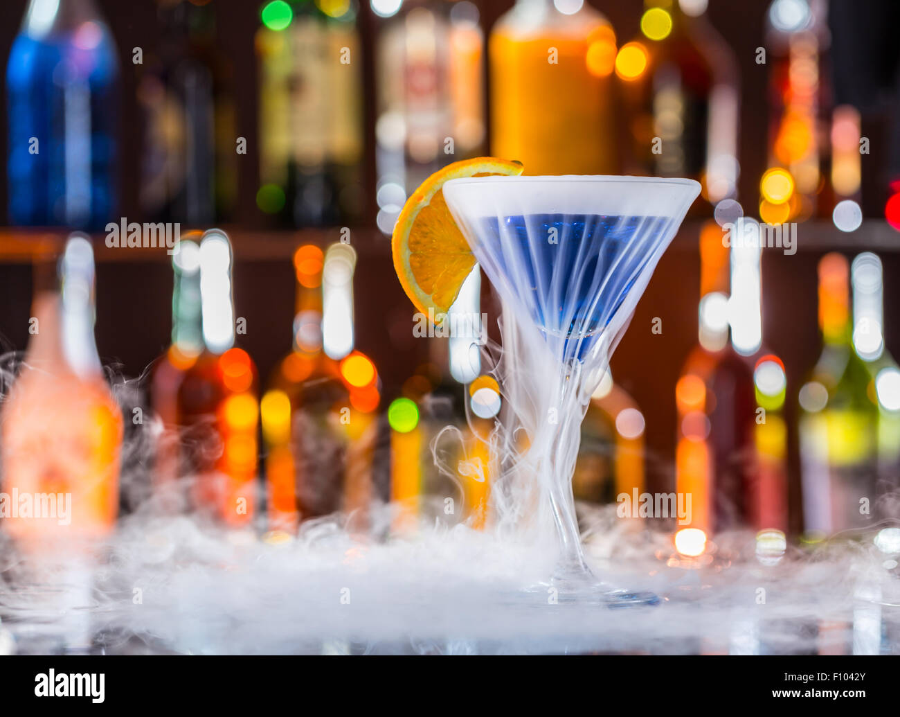Martini drink on bar counter Stock Photo