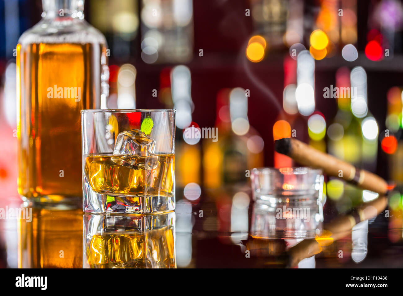 Whiskey drink on bar counter Stock Photo