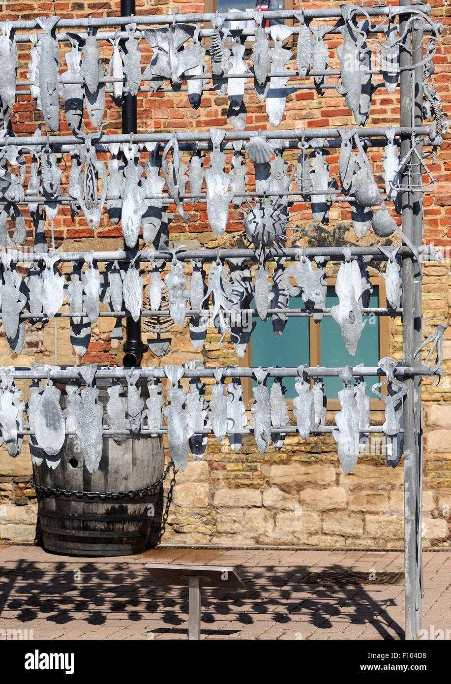 Detail of a sculpture representing racks of drying fish used on the ...