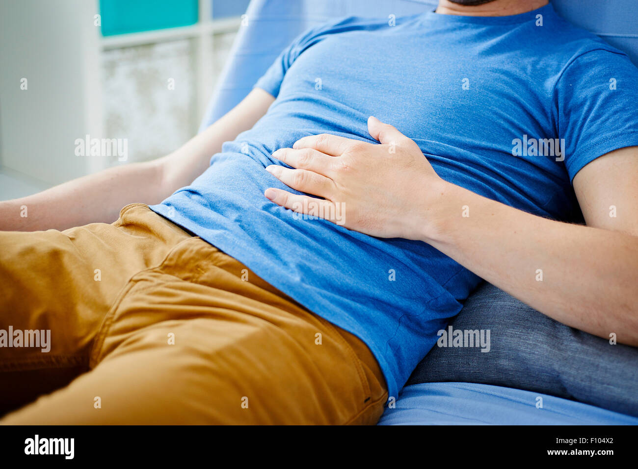 MAN WITH ABDOMINAL PAIN Stock Photo Alamy