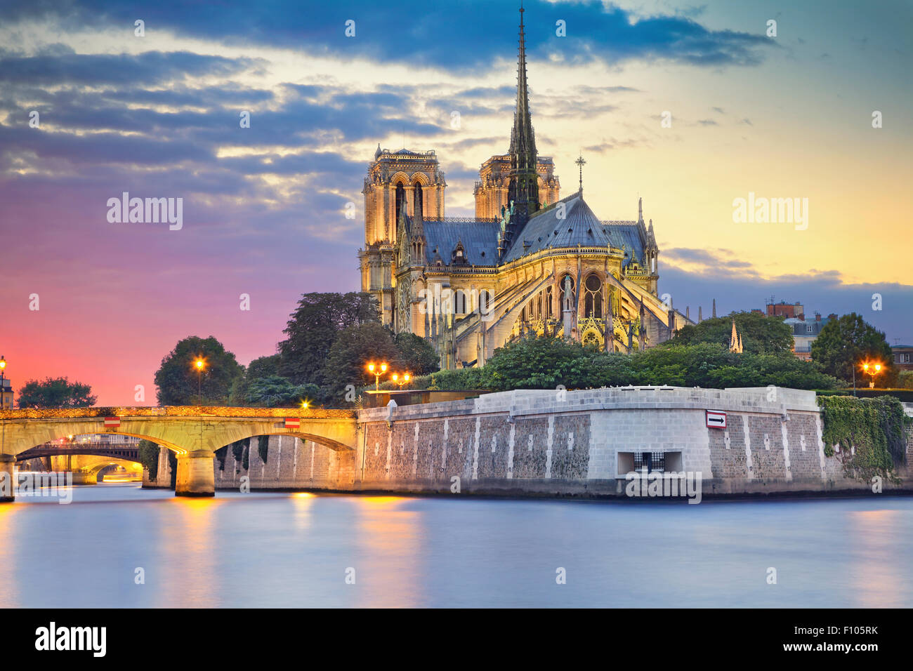 Image of Notre Dame Cathedral at dusk in Paris, France. Stock Photo
