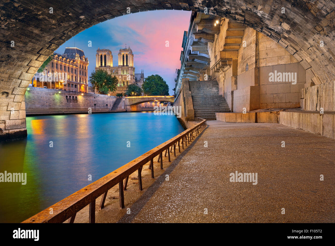 Paris. Image of the Notre-Dame de Paris Cathedral and riverside of Seine river in Paris, France. Stock Photo