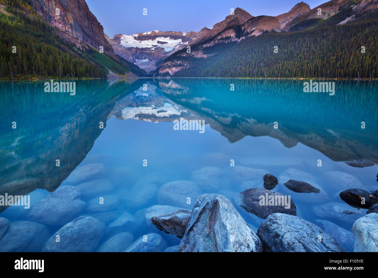 Beautiful Lake Louise in Banff National Park, Canada. Photographed at dawn. Stock Photo
