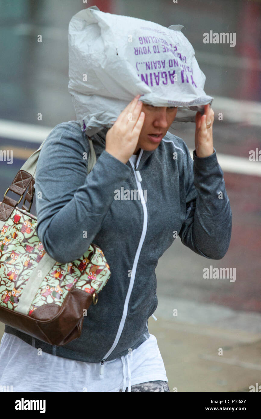 cover head with plastic bag for rain 6PCS Bonnet Visor Clear Rain Hats Waterproof Rain Scarf Rain Bonnet Protect Hairstyle Unisex Men Women Lady Rain Wear Rain Rain Cap for White at Amazon Lightweight purse protector and cover slides over handles to guard bags in any rain. Wimbledon London,UK. 24th August 2015.