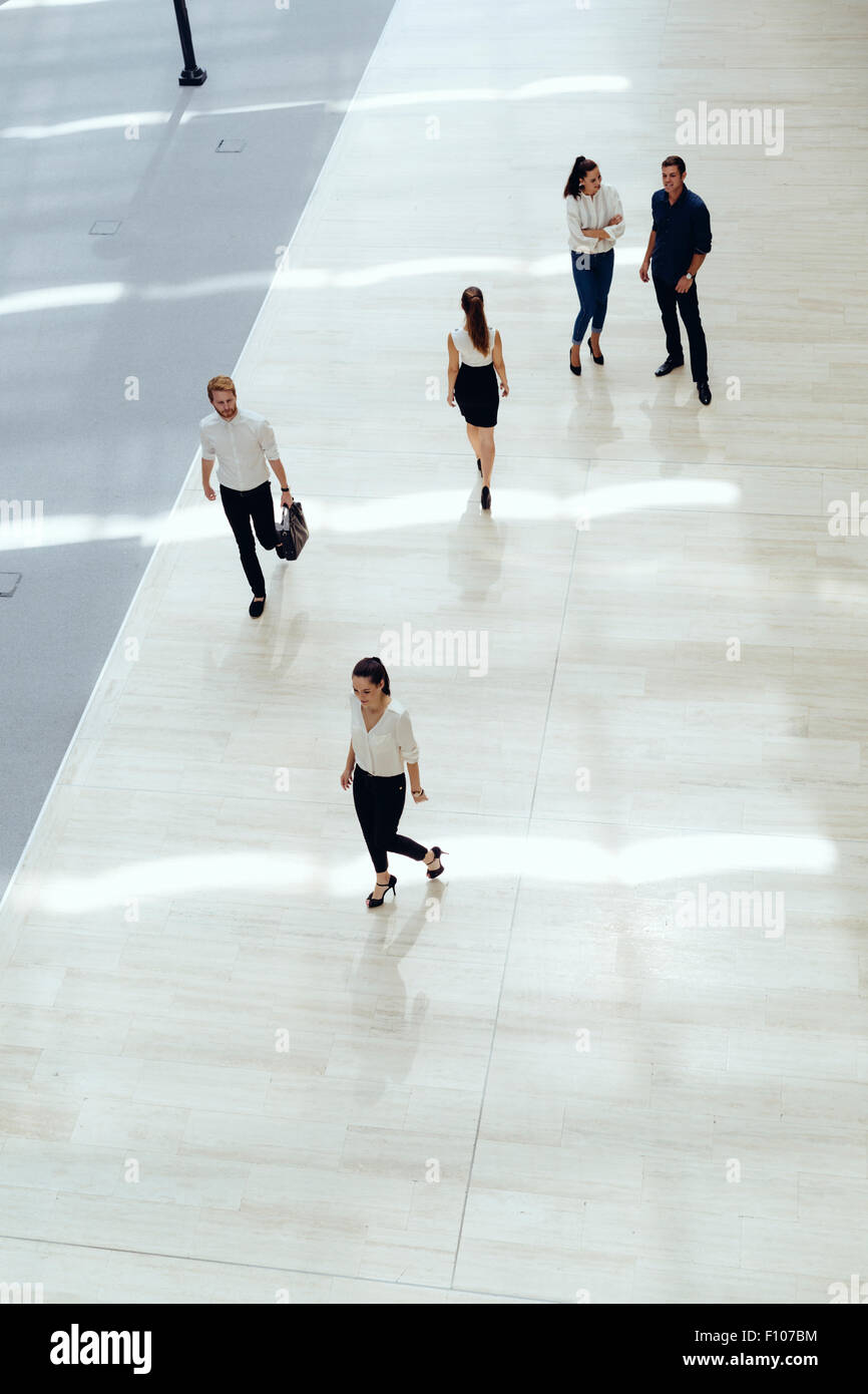 Young business people before starting work in their office Stock Photo