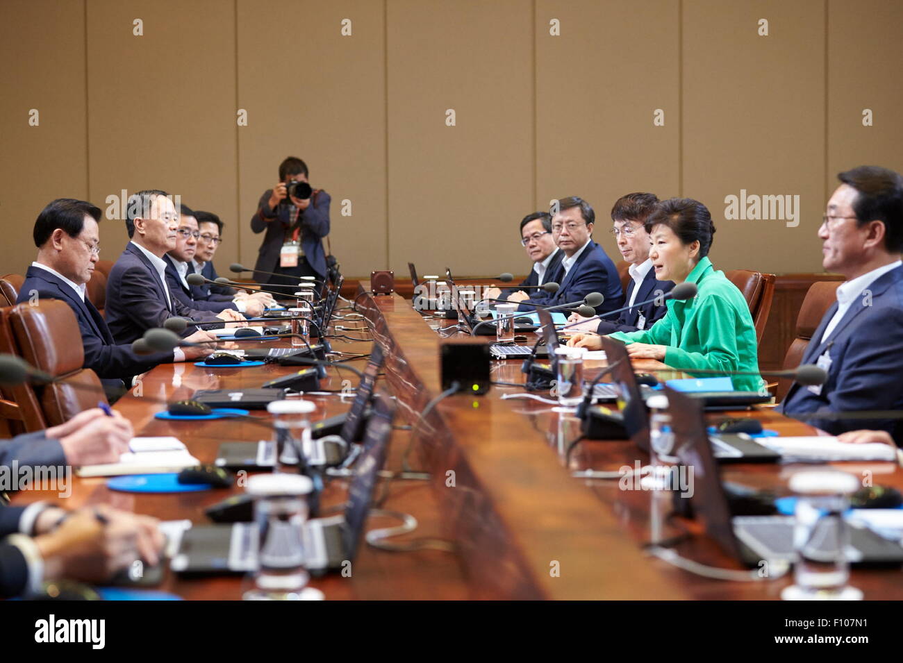 Seoul, South Korea. 24th Aug, 2015. South Korean President Park Geun-hye (2nd R) speaks during a meeting with senior presidential secretaries in Seoul, capital of South Korea, Aug. 24, 2015. South Korean President Park Geun-hye has demanded the Democratic People's Republic of Korea (DPRK) to apologize for alleged provocations as emergency contact between the two sides continues, the presidential office said Monday. © Xinhua Photo/Alamy Live News Stock Photo