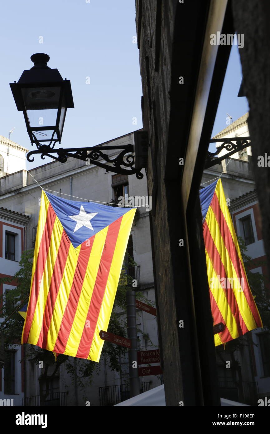 Catalan independence flag hanging from a lamp in Girona Catalonia, Spain Stock Photo