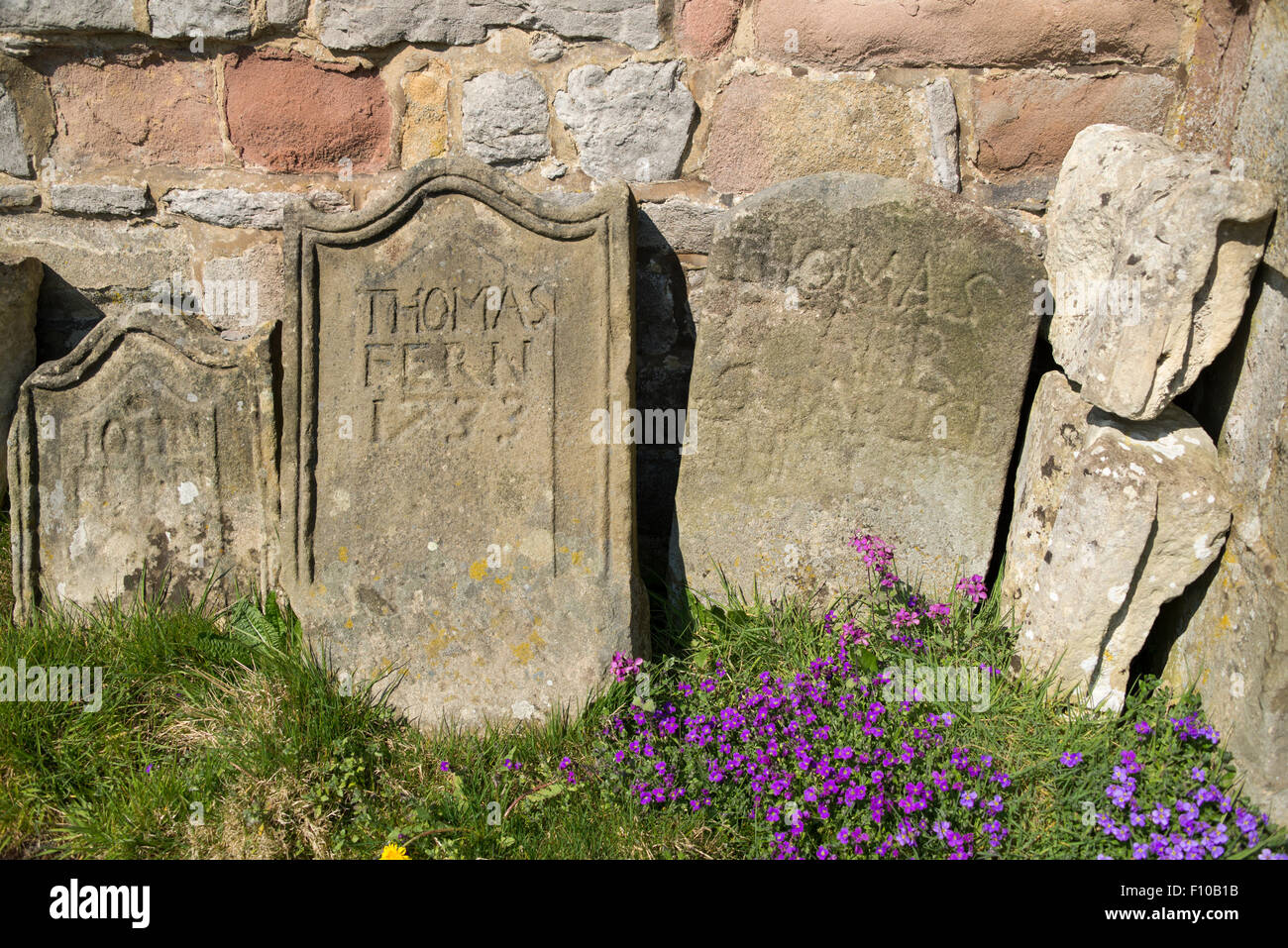 Ancient headstones, St Giles Church, Hartington, Peak District National Park, Derbyshire, England, UK. Stock Photo