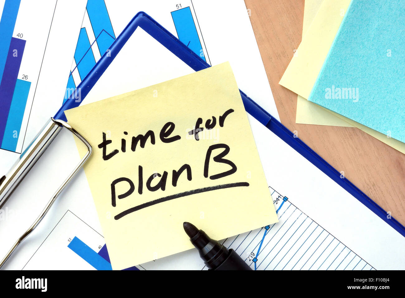 Paper with words time for plan b and charts Stock Photo Alamy