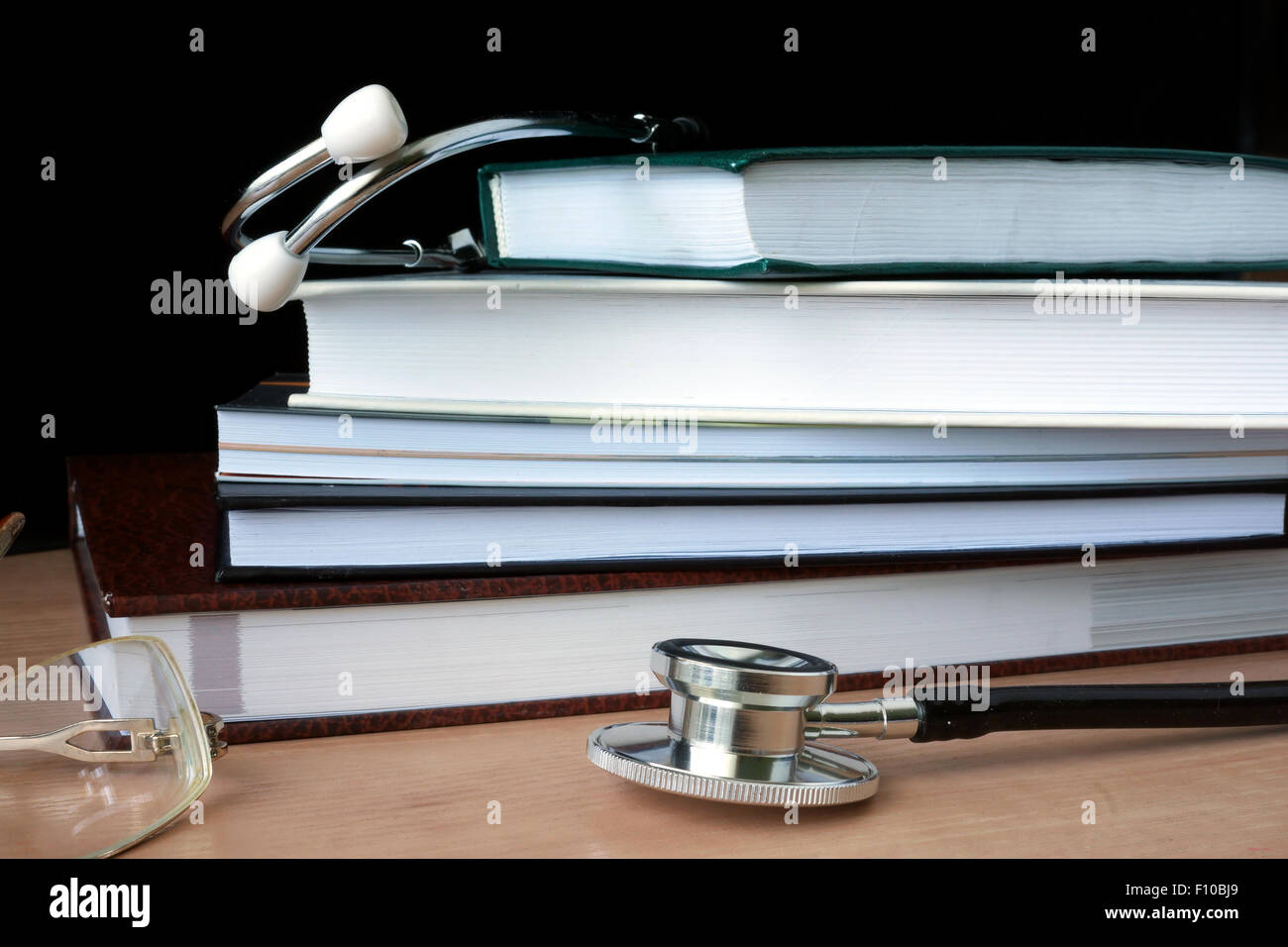 Stethoscope with books. Medical education concept Stock Photo Alamy