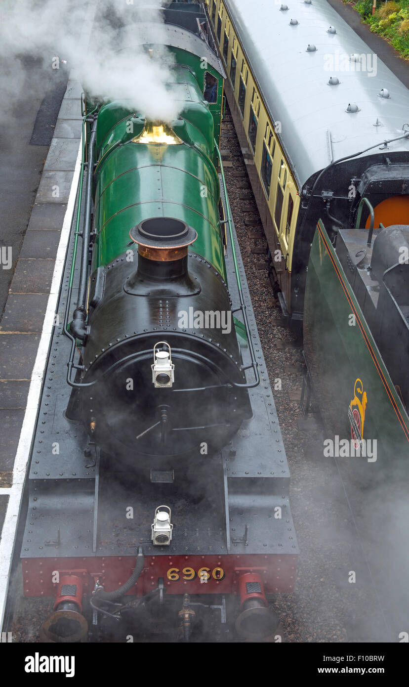 Gloucestershire Warwickshire Railway at Toddington station with two steam engines waiting to leave Stock Photo