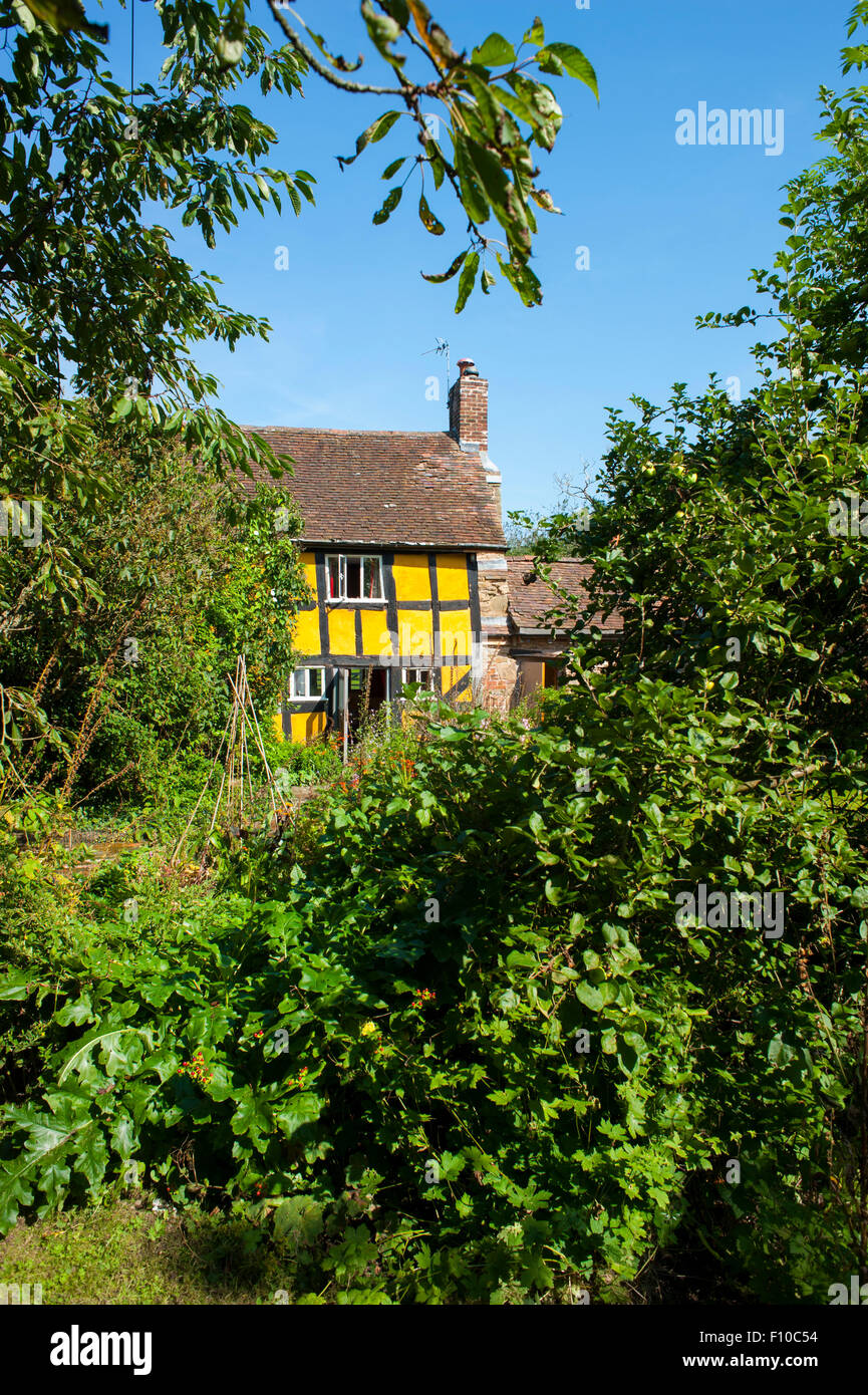 Timber-framed cottage during summertime in Worcestershire, England. Stock Photo