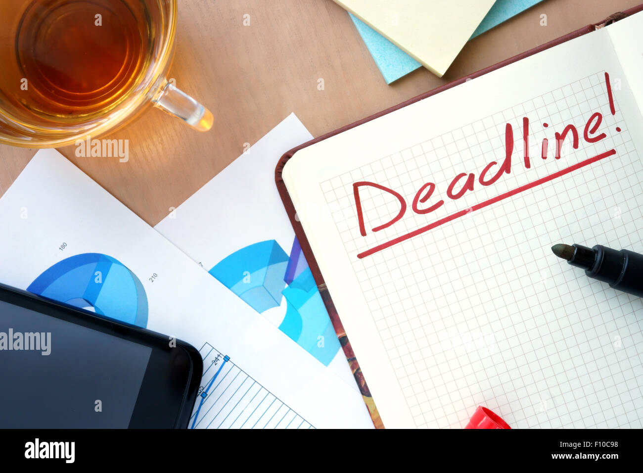 Notepad with word deadline concept and marker. Stock Photo