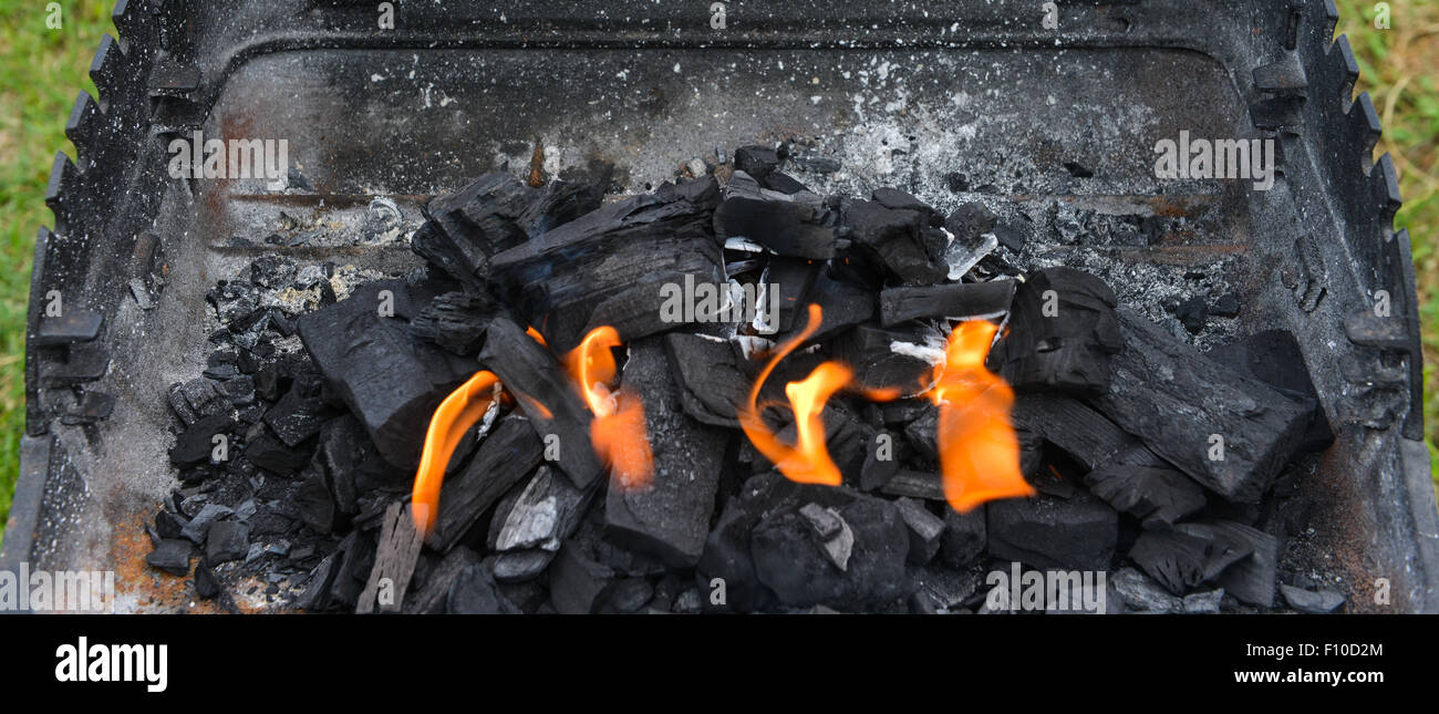 Burning charcoal on barbecue grill Stock Photo Alamy