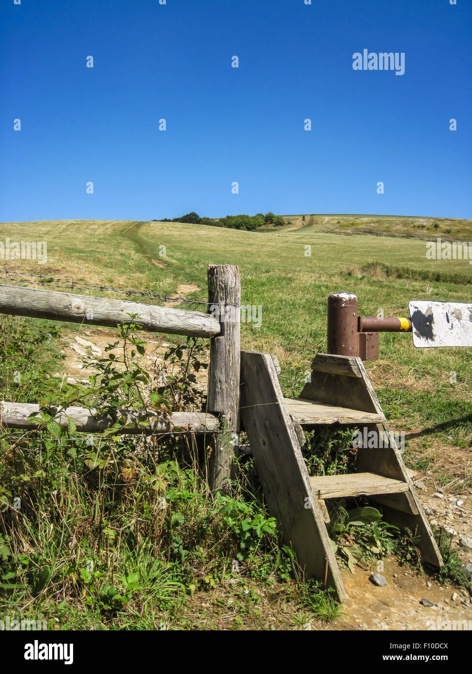 A fence crossing before the climb up to Max Patch on the Appalachian Trail Stock Photo