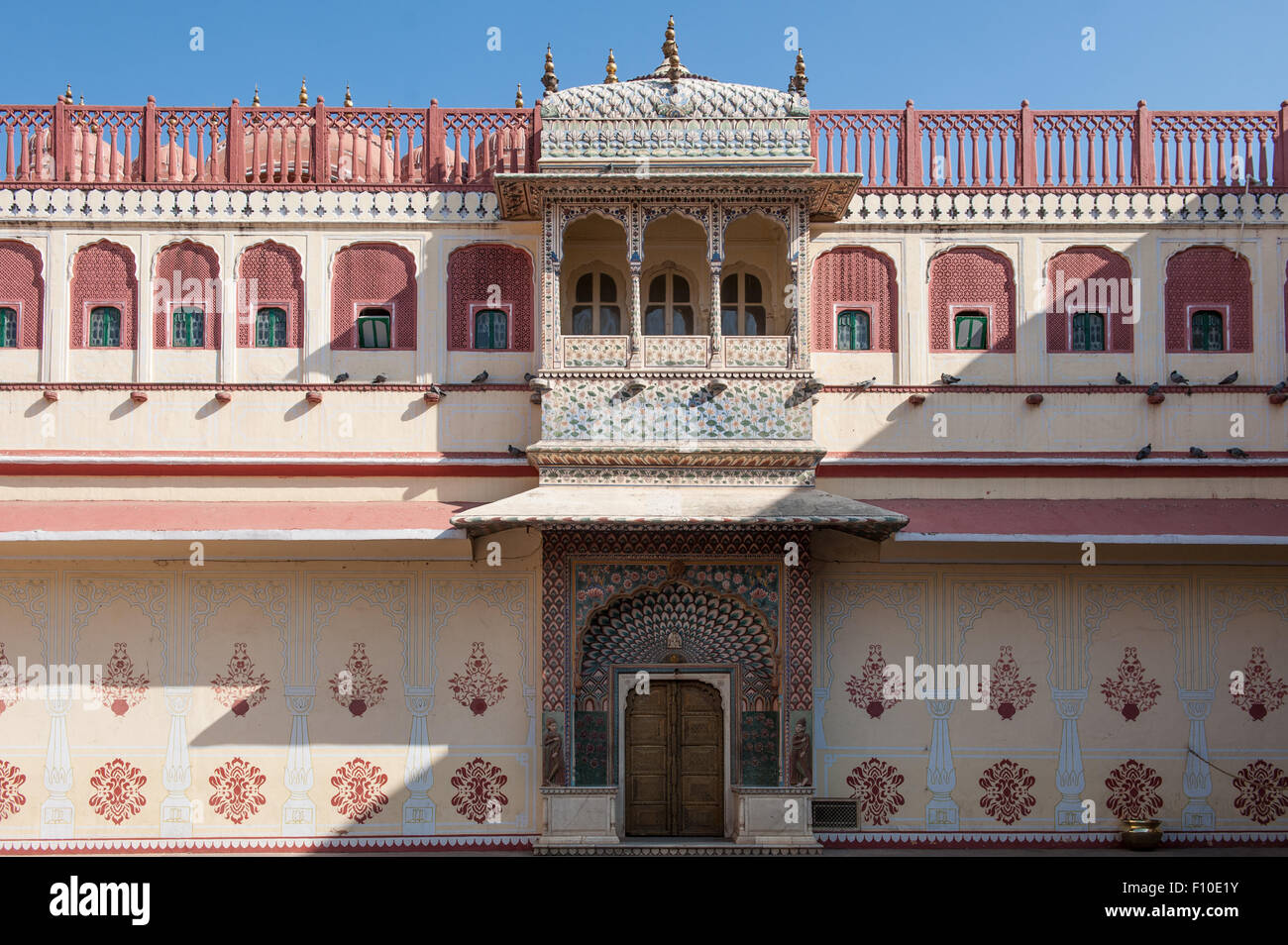 Jaipur, India. The  City Palace Pritam Niwas Chowk courtyard; detail of the Southwest Lotus gate, dedicated to Lord Shiva-Parvati with painted flowers and petals. Stock Photo