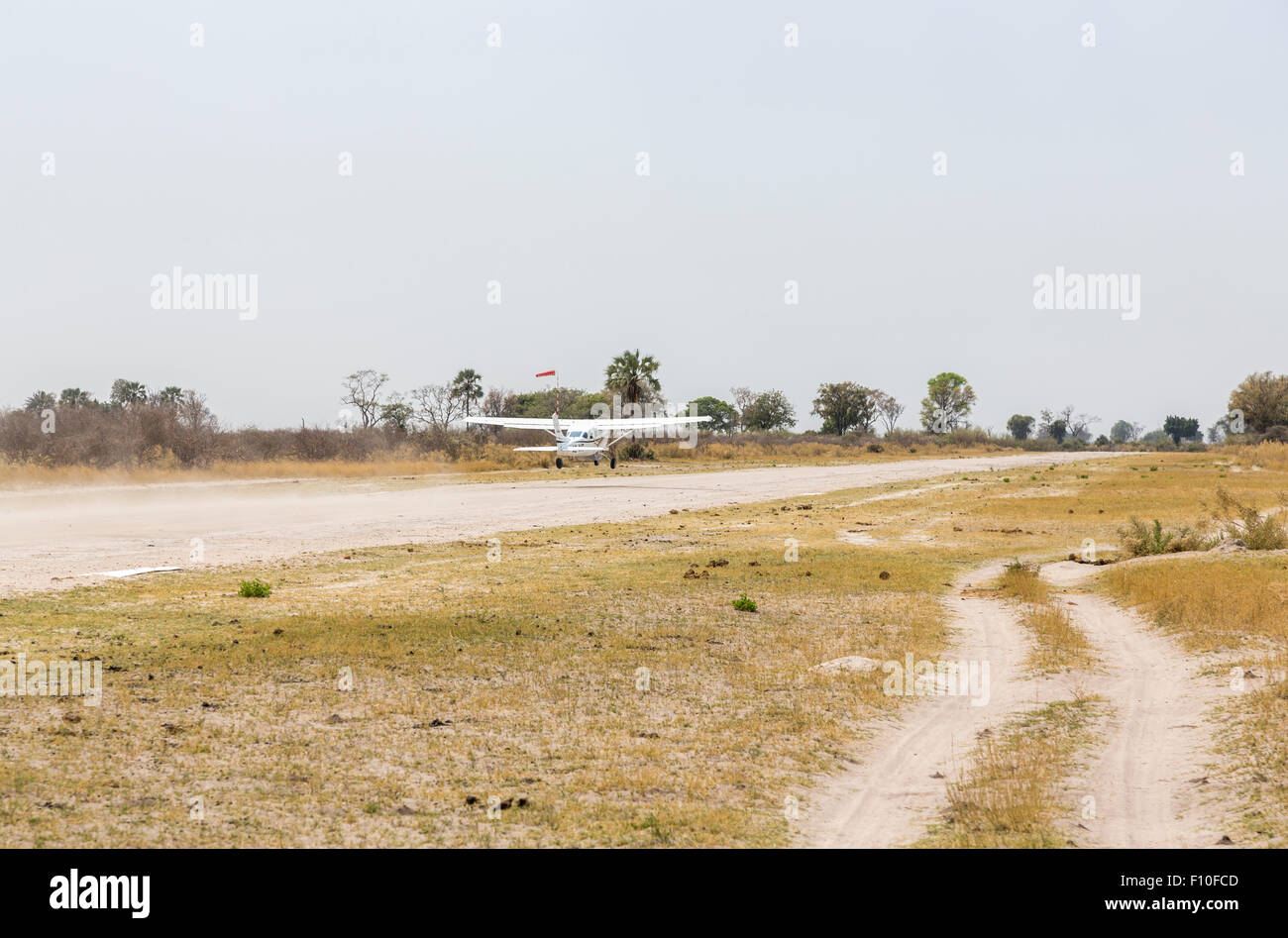 A Mack Air light aircraft taking off from an airstrip at Duba Plains, Okavango Delta, north Botswana, southern Africa Stock Photo