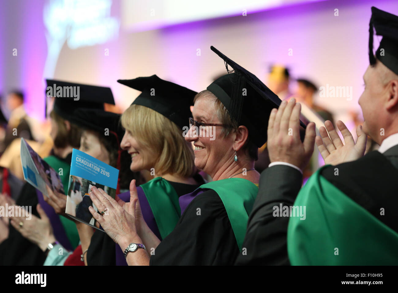 graduating students in cap and gowns Stock Photo - Alamy