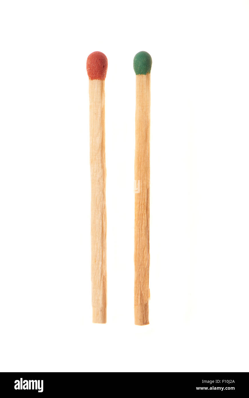 Green and red wooden matches isolated on white background Stock Photo