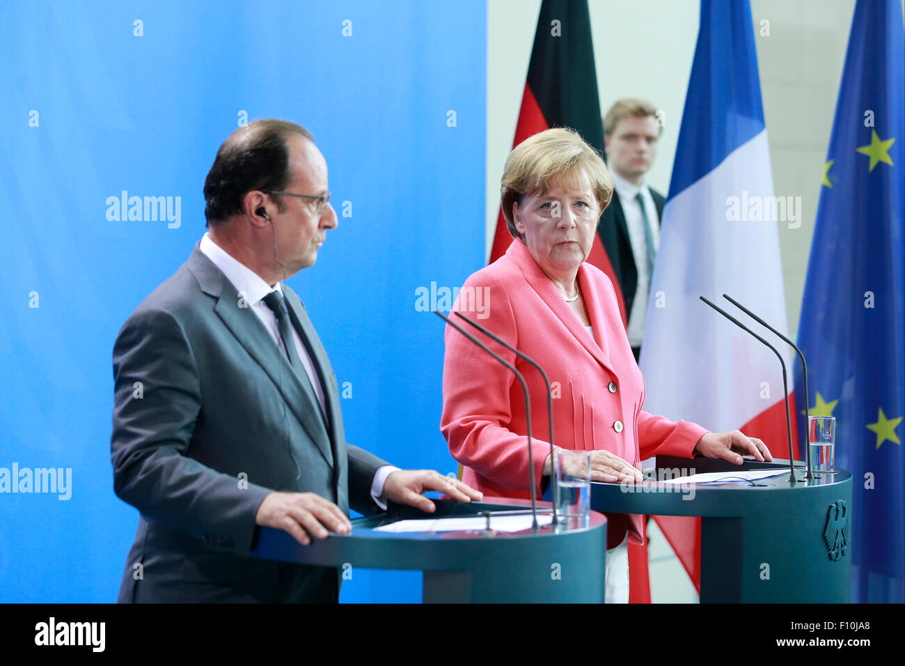 Berlin, Germany. 24th Aug, 2015. Angela Merkel, German Chancellor and François Hollande, French president give a joint Press Statements before meeting in Berlin, Germany on 24 August 2015: / Picture: Angela Merkel, German Chancellor and François Hollande, French president. Credit:  Reynaldo Chaib Paganelli/Alamy Live News Stock Photo
