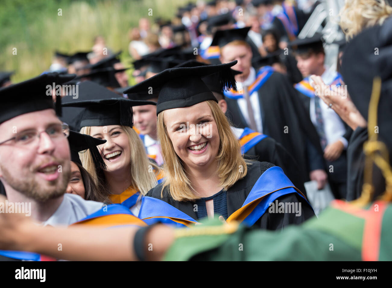 graduating students in cap and gown Stock Photo - Alamy