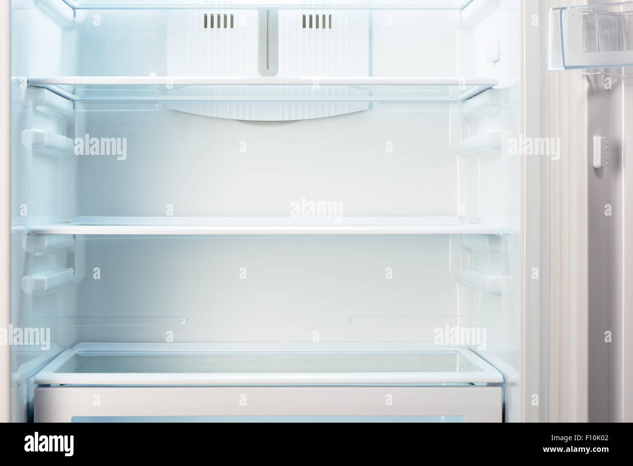 White open empty refrigerator. Weight loss diet concept. Stock Photo