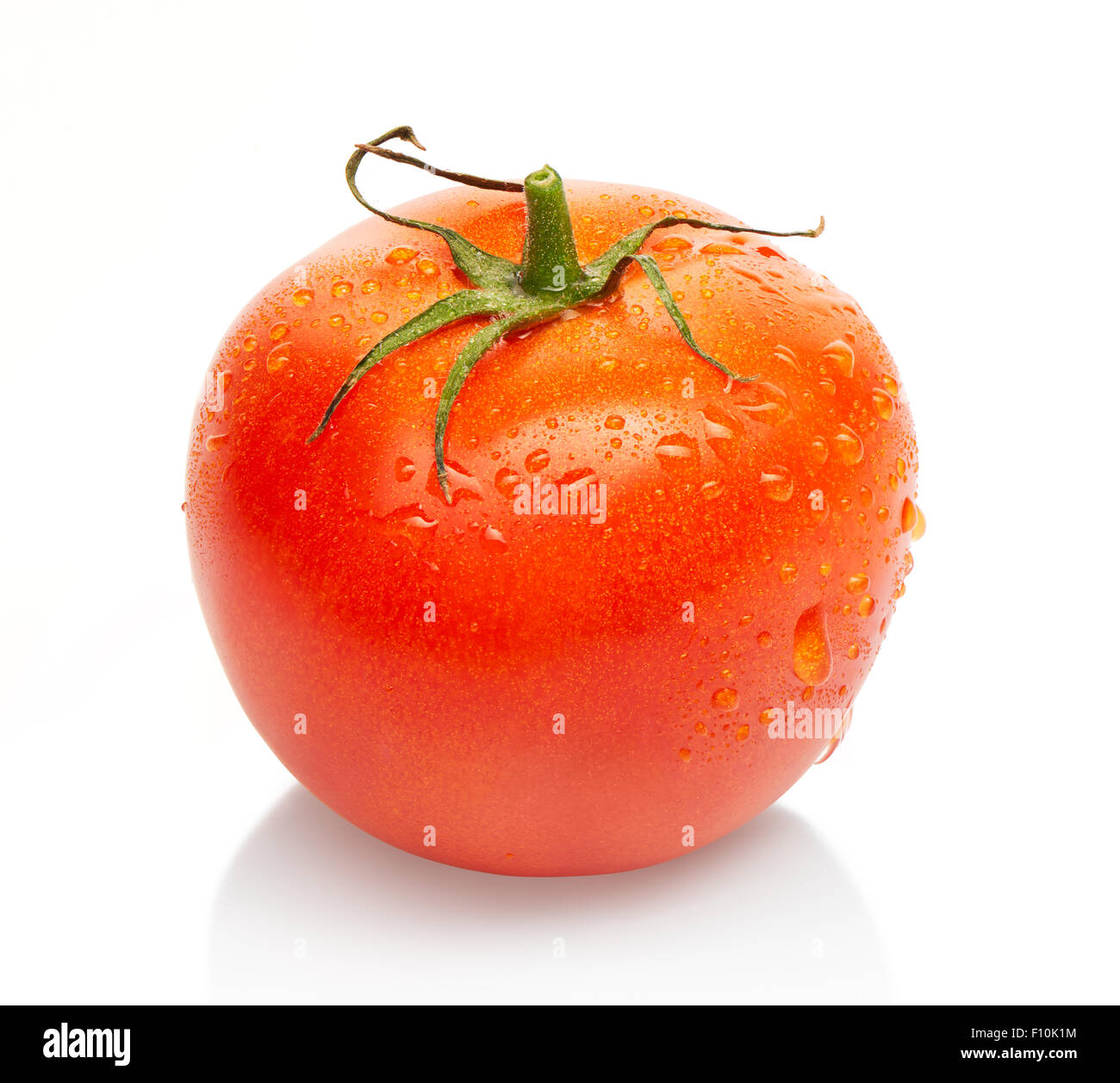 Red tomato with drops of water isolated on white background. Clipping ...