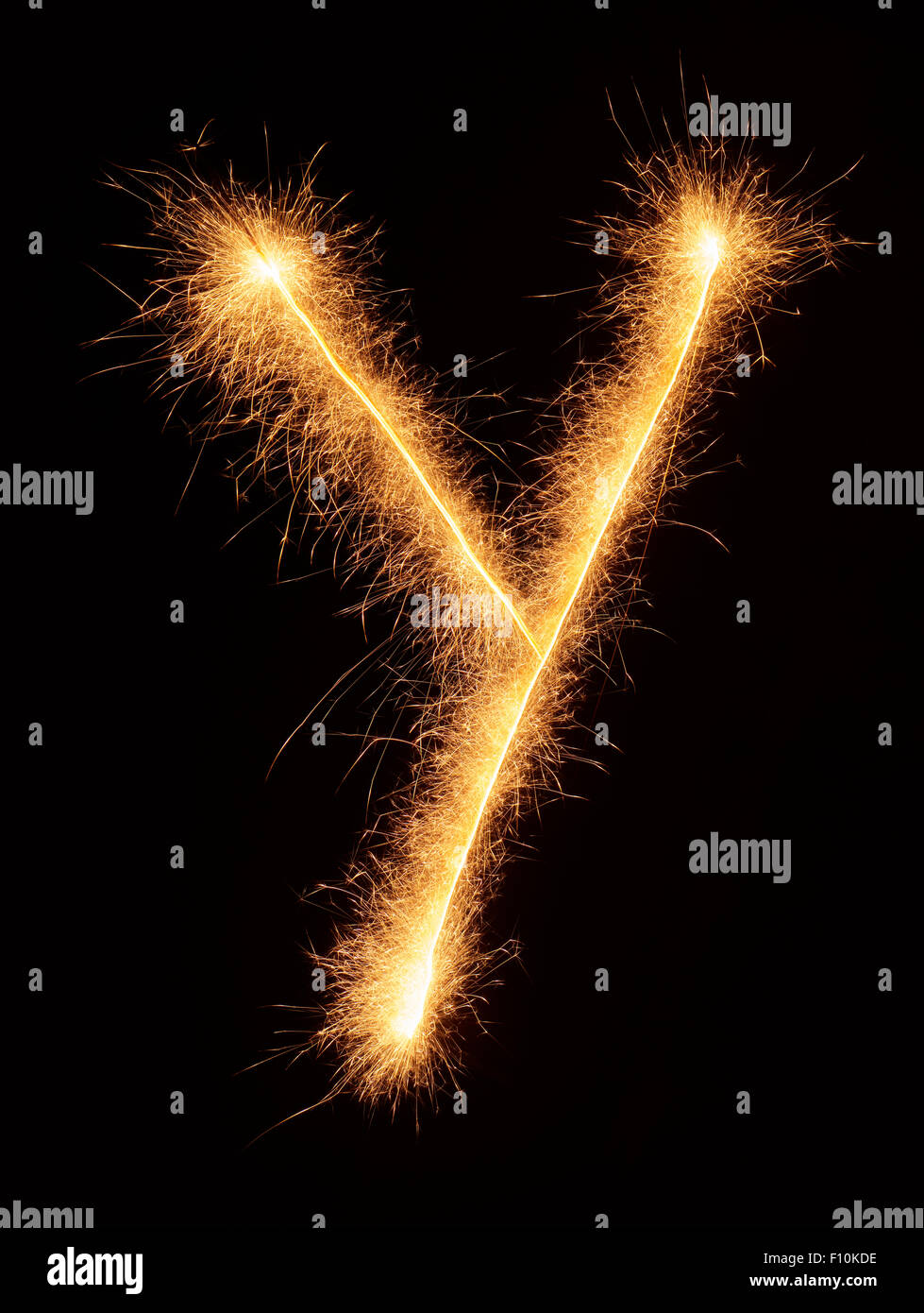 'Y' letter drawn with bengali sparkles isolated on black background Stock Photo